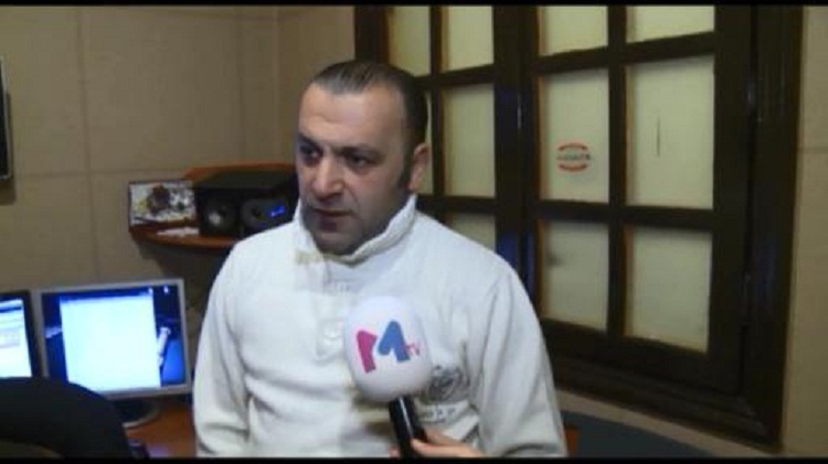 Müğənni Faytonçu Nazim gözəl xanımla bir arada