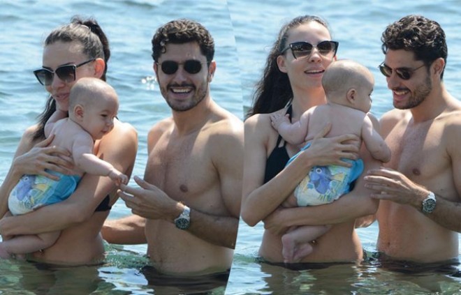 Futbolçu ailəsi ilə çimərlikdə görüntüləndi