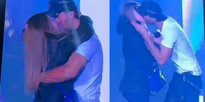 Məşhur müğənni pərəstişkarı ilə öpüşdü - video