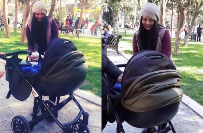 Rəqqasə Oksana oğlu ilə gəzintidə