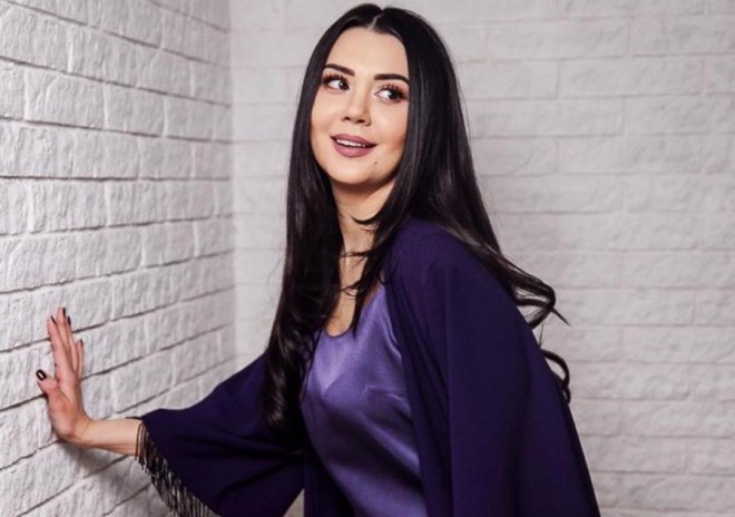 Oksana onun adından istifadə edən qadını tutdurdu