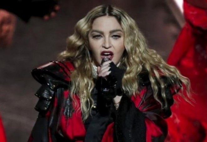Madonna məhkəməyə verildi