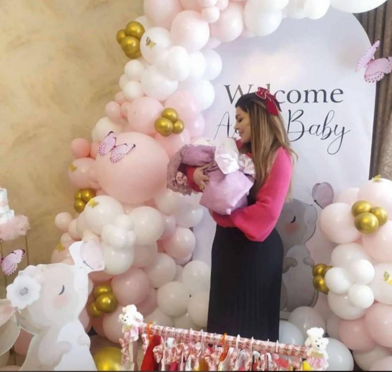 Nəvəsi ilə ilk fotosu