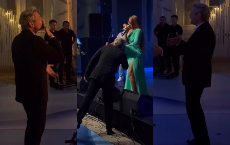 Pop divanın əlindən öpüb