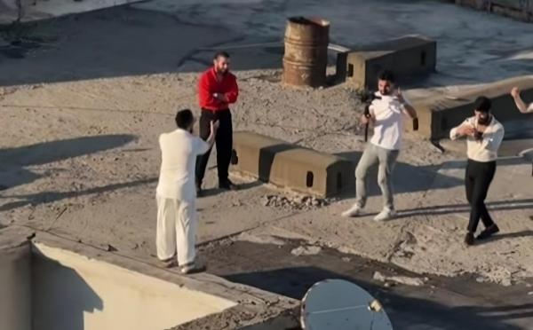 Niyam klip üçün binanın damına çıxdı - FOTO